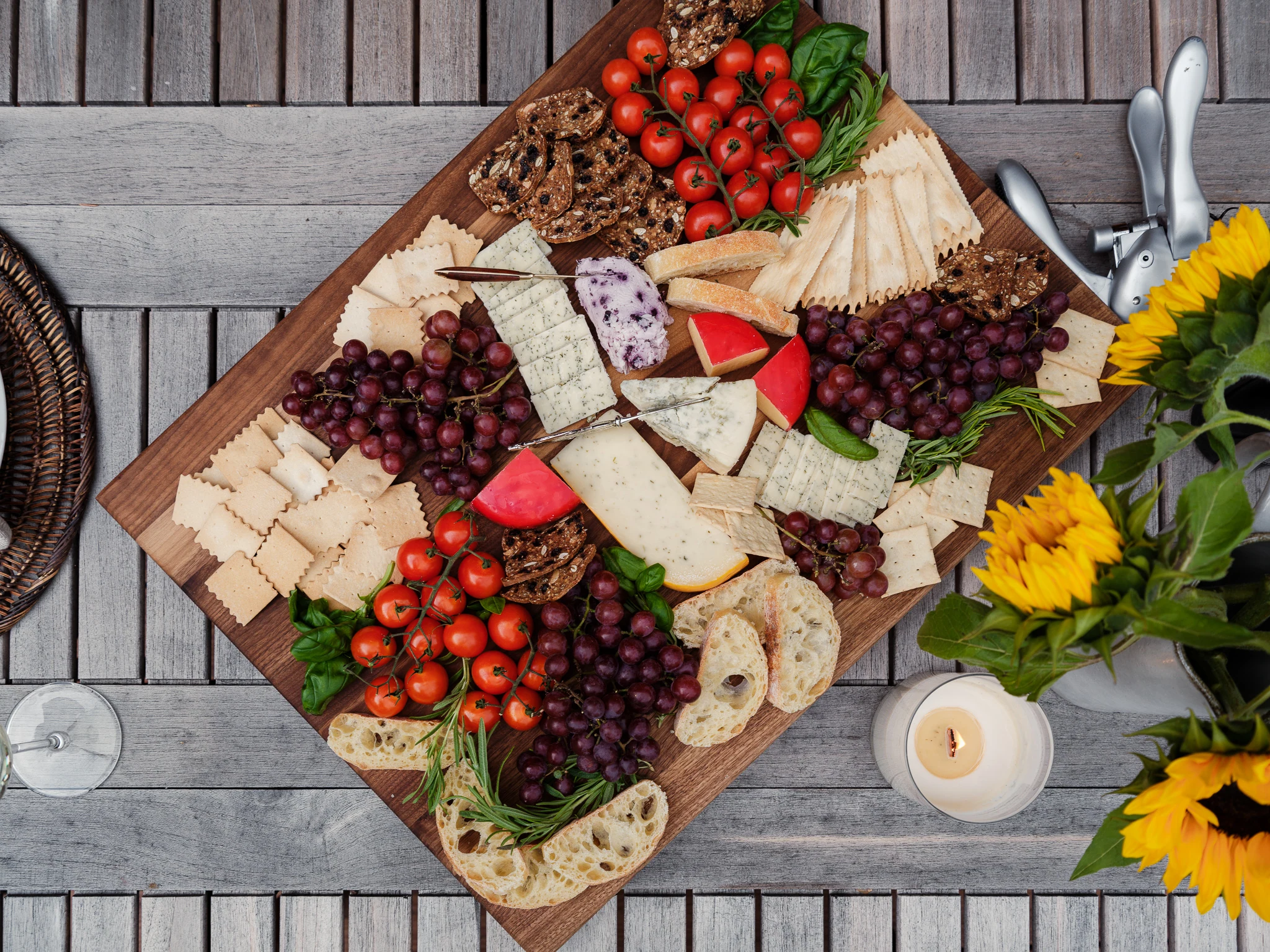 Overhead charcuterie board styled with sunflowers — interior design photography Livingston Montana, Bear Canyon Ranch